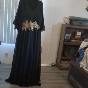 Elegant Black Gown with Gold Embellishments
